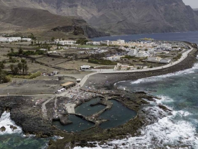 A volcanic fortress by the sea in the Salinas de Agaete in Gran Canaria